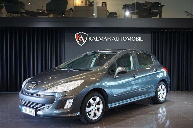 Mörkgrå Begagnad 2010 Peugeot 308 Halvkombi | 39 900 kr (Marknadspris) - Bild 1/4