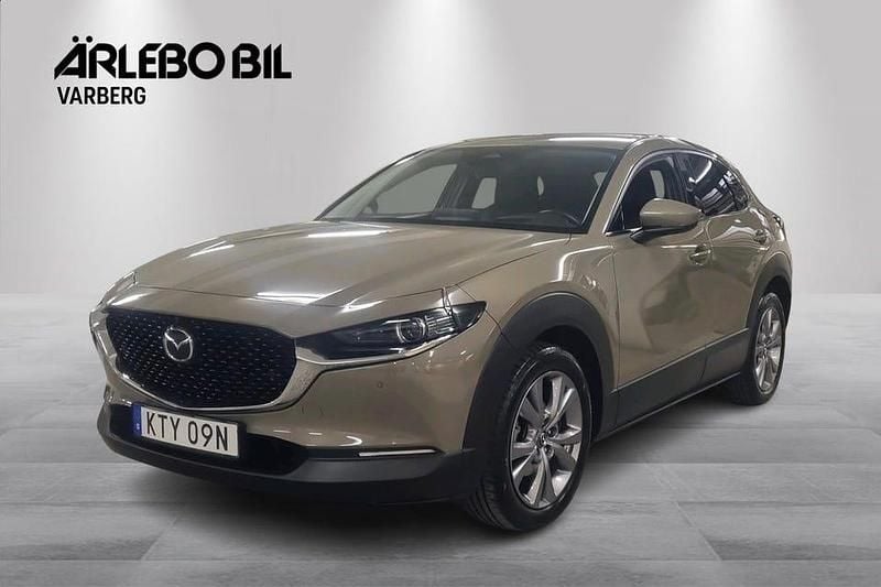 Zircon sand Begagnad 2024 Mazda CX-30 Takumi-Line SUV | 329 900 kr (Marknadspris) - Bild 1/4