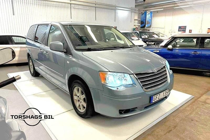 Ljusblå (blå) Begagnad 2008 Chrysler Grand Voyager Minibuss | 64 900 kr (Lite dyr) - Bild 1/4