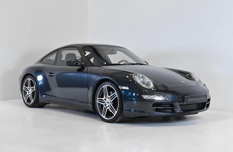 Mörkgrå (grå) Begagnad 2006 Porsche 911 Carrera 4 Sportkupé | 479 900 kr - Bild 1/4