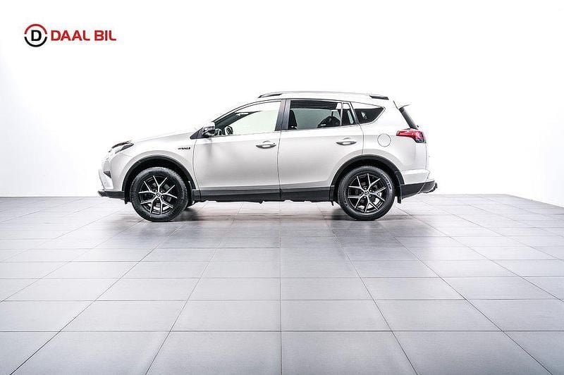 Vit Begagnad 2015 Toyota RAV4 Hybrid SUV | 214 700 kr (Marknadspris) - Bild 1/4