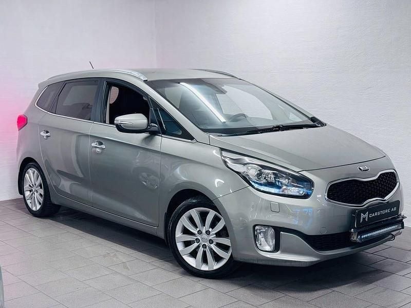 Grå Begagnad 2014 Kia Carens Minibuss | 69 900 kr (Bra pris) - Bild 1/4