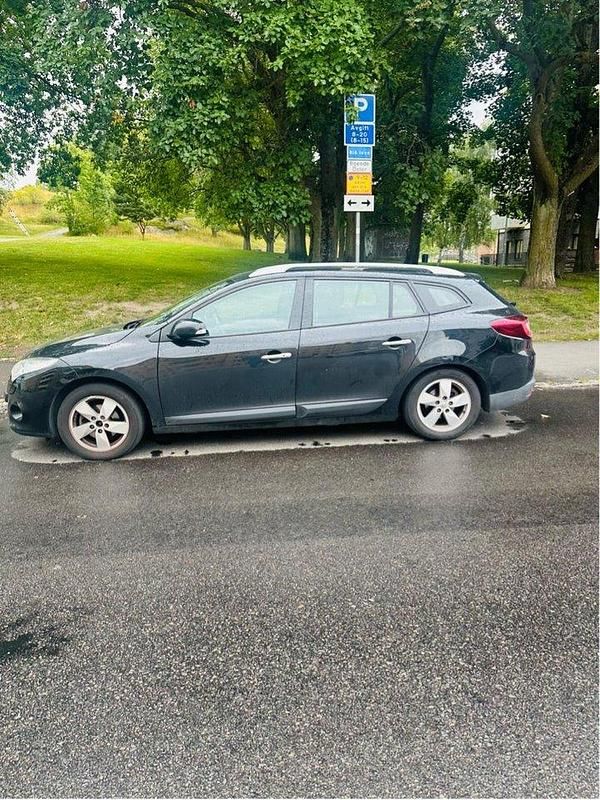 Svart Begagnad 2011 Renault Mégane GrandTour Kombi | 55 500 kr (Marknadspris) - Bild 1/4
