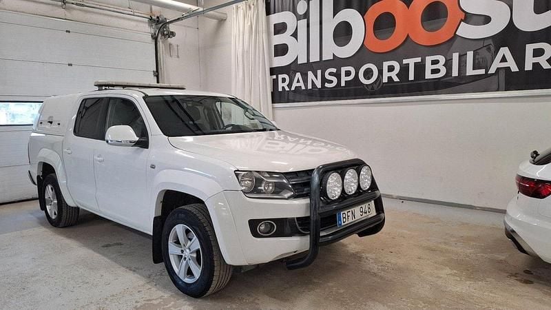 Vit Begagnad 2012 VW Amarok Highline Pickup | 188 750 kr (Marknadspris) - Bild 1/4