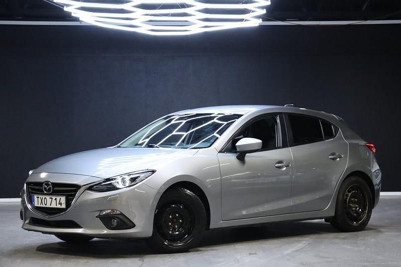 Grå Begagnad 2014 Mazda 3 Inclusive Halvkombi | 149 900 kr (Marknadspris) - Bild 1/4