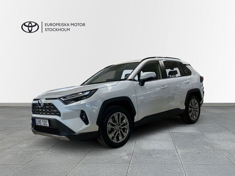 Vit Begagnad 2024 Toyota RAV4 Hybrid Executive SUV | 479 900 kr (Marknadspris) - Bild 1/4