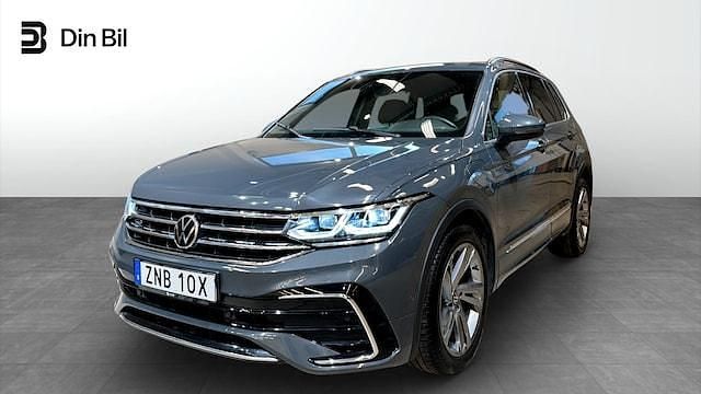Grå (dolphin grey metallic) Begagnad 2021 VW Tiguan R-line SUV | 349 500 kr (Marknadspris) - Bild 1/4