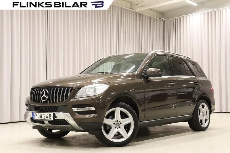 Mörkbrun Begagnad 2011 Mercedes ML350 SUV | 179 900 kr (Marknadspris) - Bild 1/4
