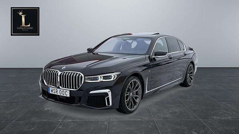Svart Begagnad 2021 BMW 740 M Sport Sedan | 749 000 kr - Bild 1/4
