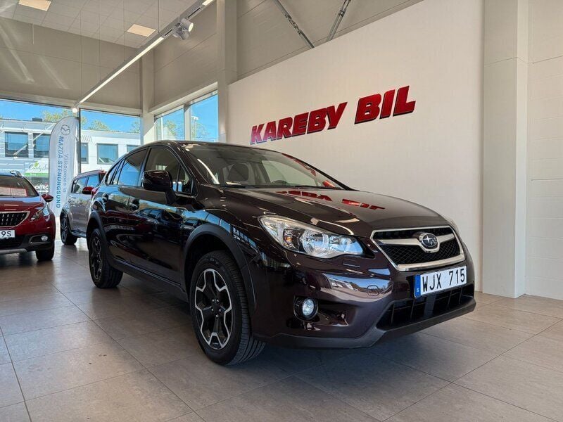 Mörkbrun Begagnad 2012 Subaru XV SUV | 134 900 kr (Marknadspris) - Bild 1/4