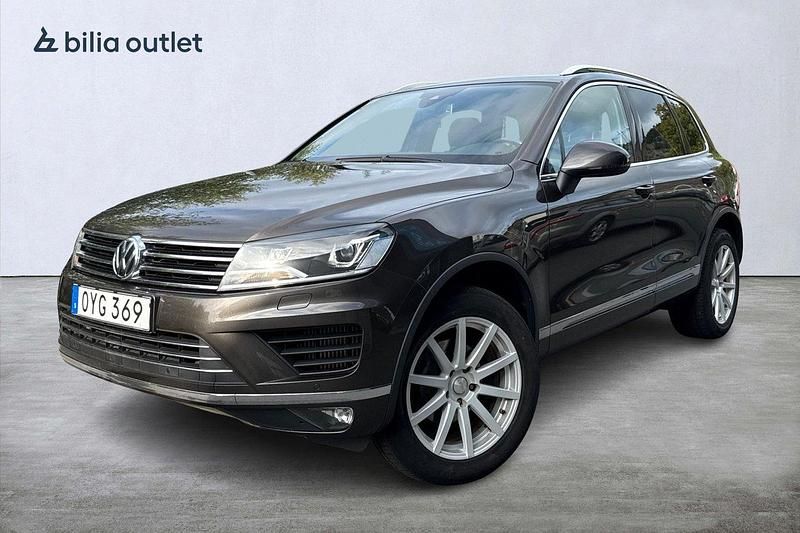Mörkbrun Begagnad 2016 VW Touareg SUV | 184 900 kr (Marknadspris) - Bild 1/3