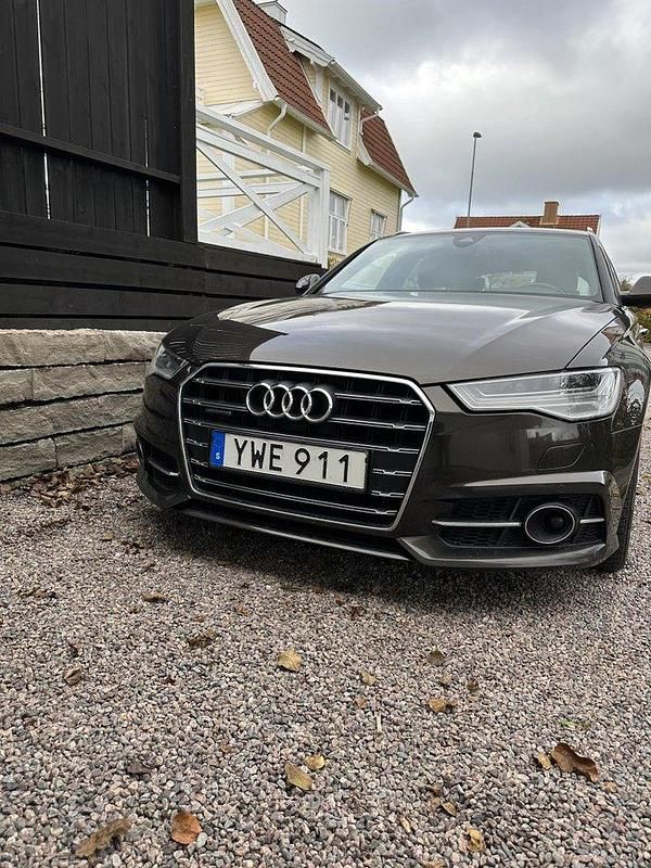 Brun Begagnad 2018 Audi A6 Ambition Kombi | 185 000 kr (Marknadspris) - Bild 1/4