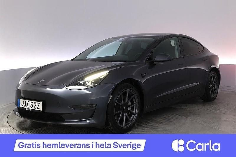 Grå Begagnad 2023 Tesla Model 3 Long Range AWD Sedan | 373 900 kr (Marknadspris) - Bild 1/4