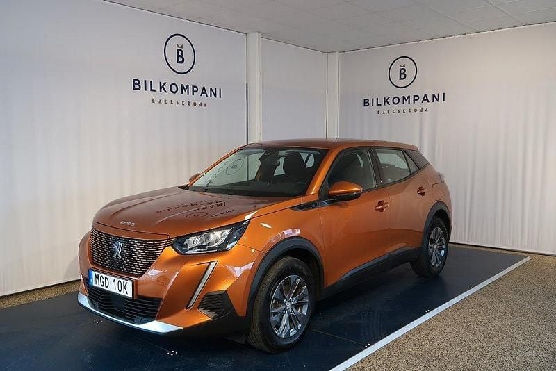 Orange Begagnad 2021 Peugeot e-2008 SUV | 159 800 kr (Marknadspris) - Bild 1/4