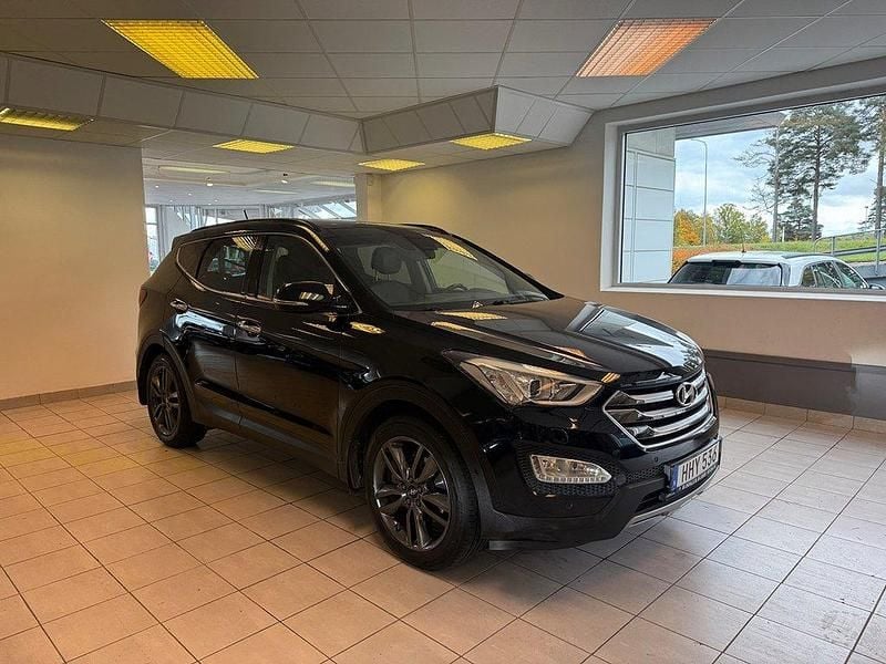 Svart Begagnad 2015 Hyundai Santa Fe Premium SUV | 149 900 kr (Marknadspris) - Bild 1/4