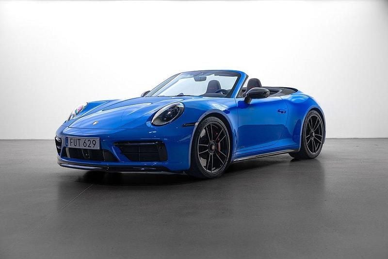 Flerfärgad (shark blue / svart sufflett) Begagnad 2023 Porsche 911 Carrera GTS Cab | 1 729 000 kr - Bild 1/4