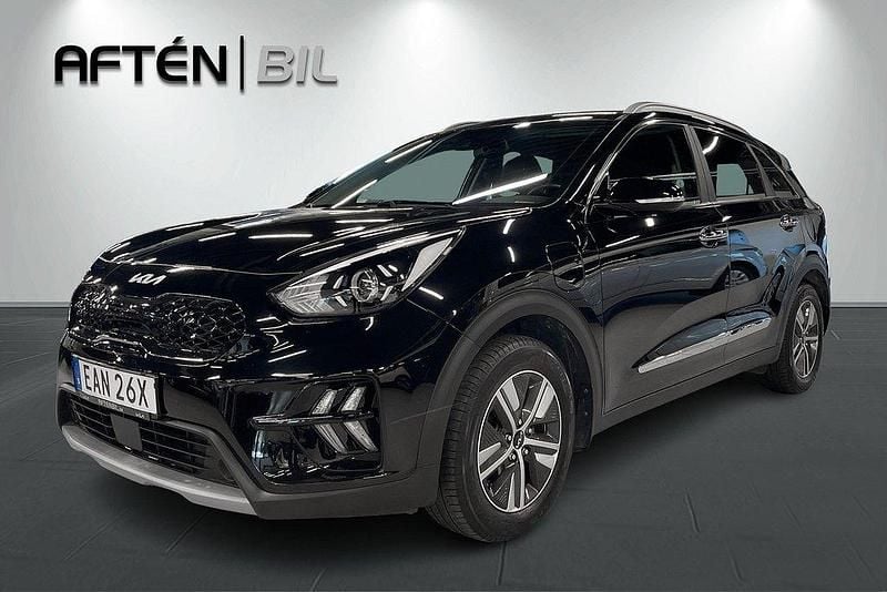 Svart (black pearl metallic) Begagnad 2021 Kia Niro Advance SUV | 249 800 kr (Bra pris) - Bild 1/3