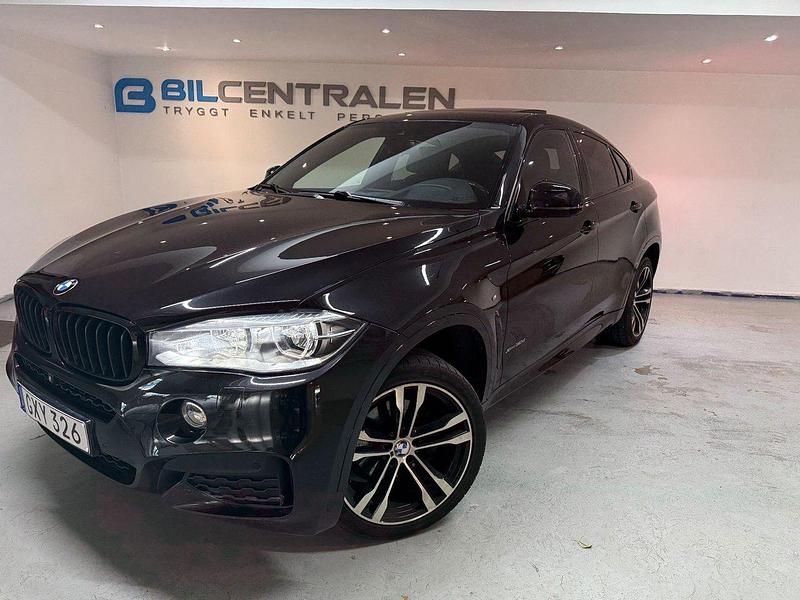 Svart Begagnad 2016 BMW X6 M Sport SUV | 329 900 kr (Marknadspris) - Bild 1/4