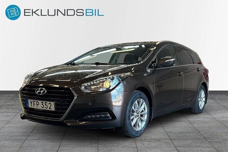 Mörkbrun Begagnad 2016 Hyundai i40 Kombi | 149 900 kr (Marknadspris) - Bild 1/4