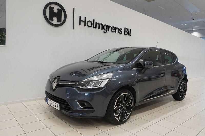 Grå Begagnad 2018 Renault Clio IV Intens Halvkombi | 115 900 kr (Marknadspris) - Bild 1/4