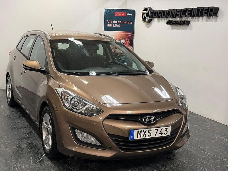 Brun Begagnad 2012 Hyundai i30 Kombi | 49 900 kr (Bra pris) - Bild 1/4