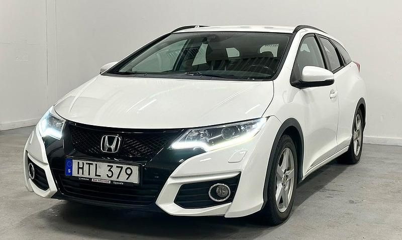 Begagnad Honda Civic 141 HK (103 kW) 2015 Vit Kombi