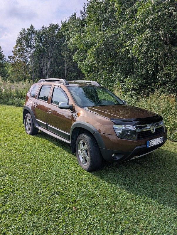 Brun Begagnad 2013 Dacia Duster SUV | 48 000 kr (Bra pris) - Bild 1/4