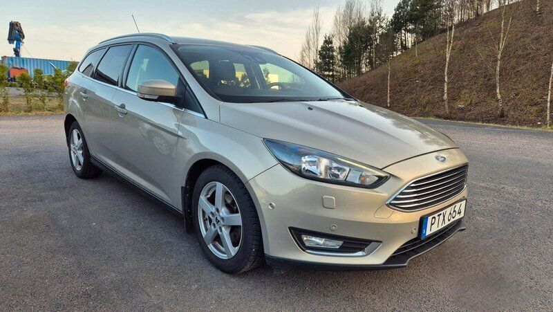 Grå Begagnad 2014 Ford Focus Titanium Kombi | 69 900 kr (Marknadspris) - Bild 1/4