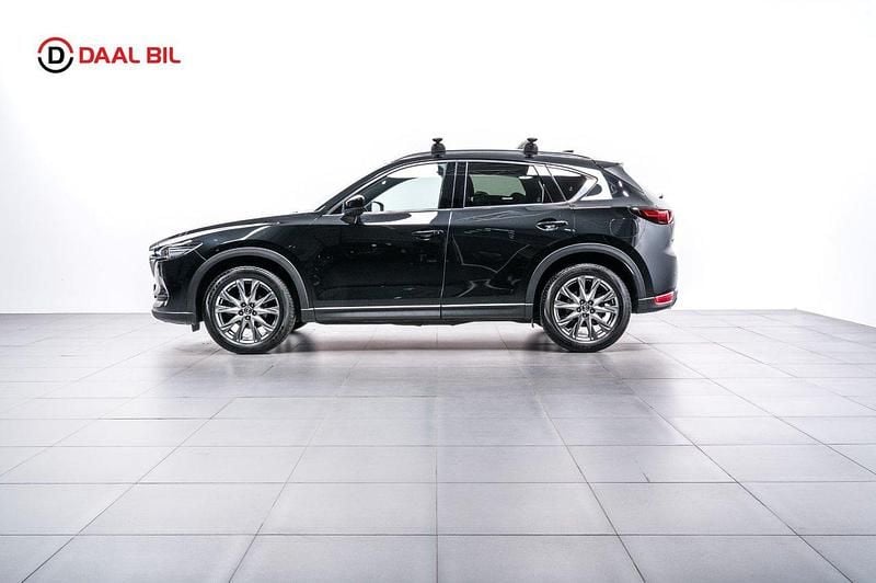 Svart Begagnad 2021 Mazda CX-5 Optimum SUV | 319 700 kr (Marknadspris) - Bild 1/4