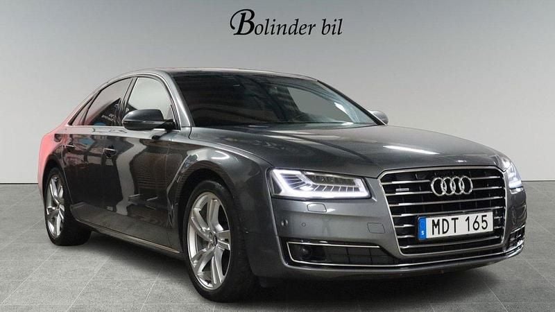 Grå Begagnad 2015 Audi A8 Sedan | 279 800 kr - Bild 1/4