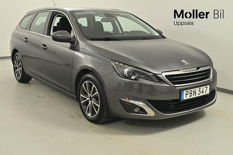 Mörkgrå (mgrå) Begagnad 2016 Peugeot 308 Allure Kombi | 129 900 kr (Marknadspris) - Bild 1/4