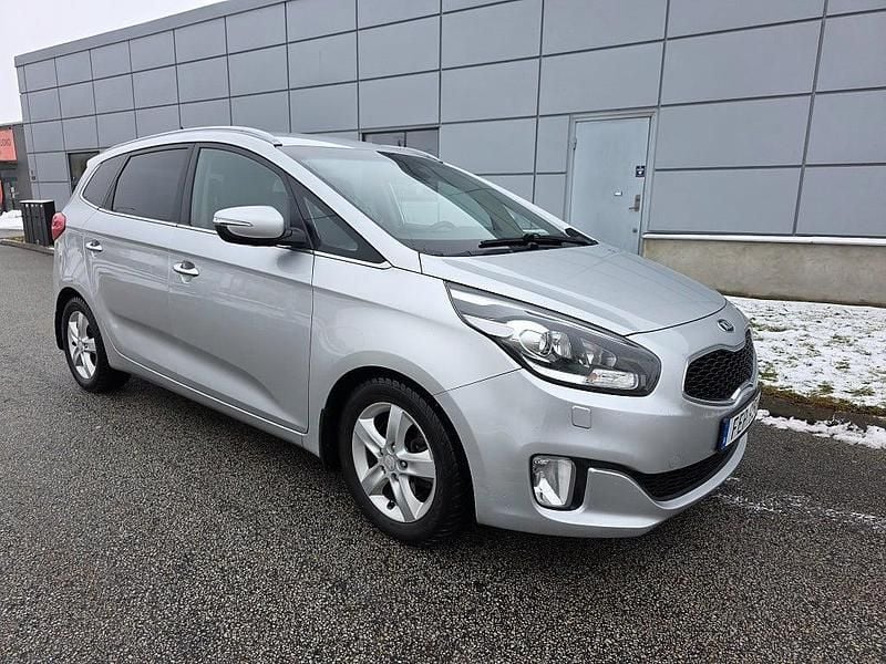 Grå Begagnad 2013 Kia Carens Minibuss | 98 500 kr (Lite dyr) - Bild 1/4