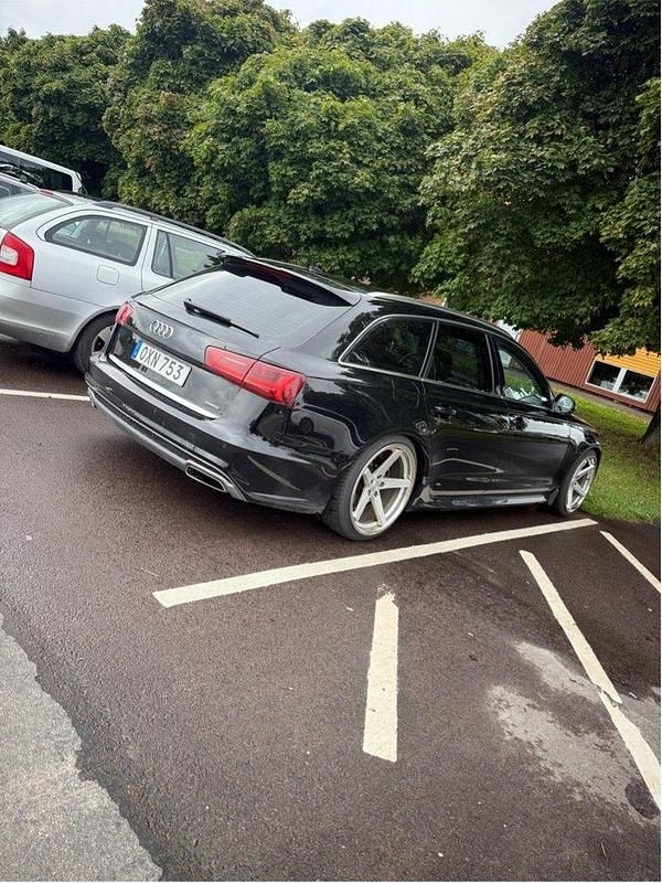Svart Begagnad 2016 Audi A6 Ambition Kombi | 165 500 kr (Bra pris) - Bild 1/4