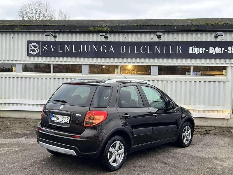 Begagnad Suzuki SX4 120 HK (88 kW) 2013 Brun Halvkombi