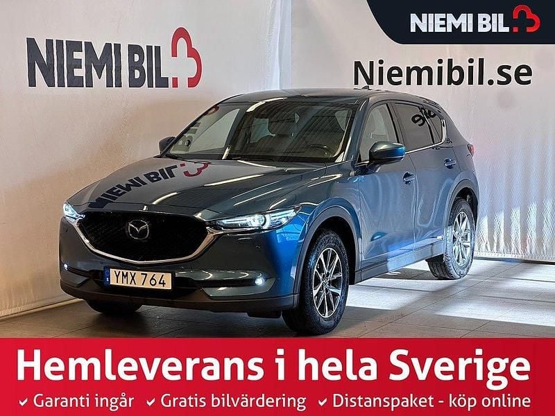 Blå Begagnad 2018 Mazda CX-5 Optimum SUV | 259 900 kr (Marknadspris) - Bild 1/3
