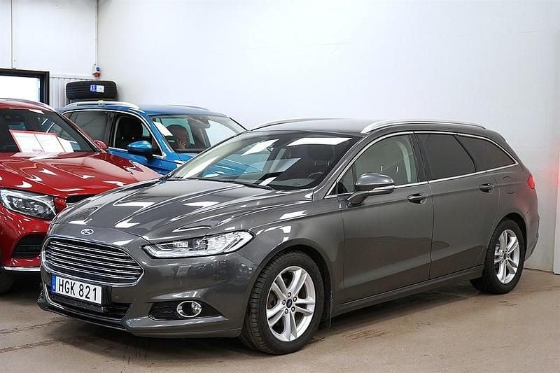 Grå Begagnad 2015 Ford Mondeo Titanium Kombi | 129 900 kr (Marknadspris) - Bild 1/4