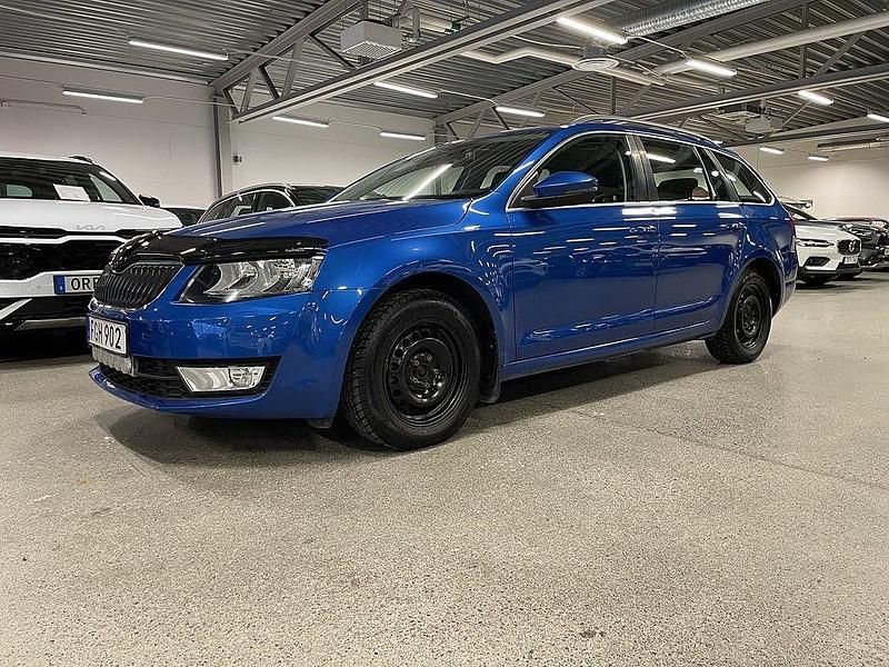 Blå Begagnad 2014 Skoda Octavia Ambition Kombi | 144 900 kr (Dyr) - Bild 1/4