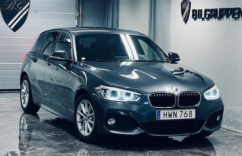 Grå Begagnad 2015 BMW 116 Shadowline Halvkombi | 159 000 kr (Marknadspris) - Bild 1/4