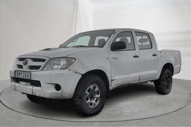 Vit Begagnad 2007 Toyota HiLux Pickup | 149 000 kr (Marknadspris) - Bild 1/4