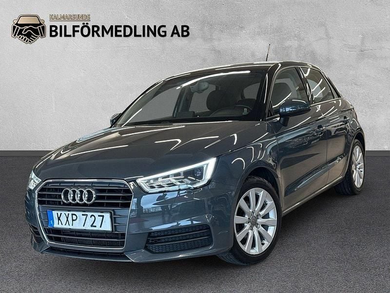 Grå Begagnad 2015 Audi A1 Sportback Sport Halvkombi | 114 702 kr (Marknadspris) - Bild 1/4