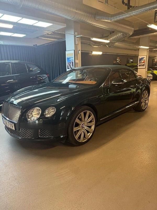 Grön Begagnad 2013 Bentley Continental GT Convertible Cab | 1 049 000 kr - Bild 1/4