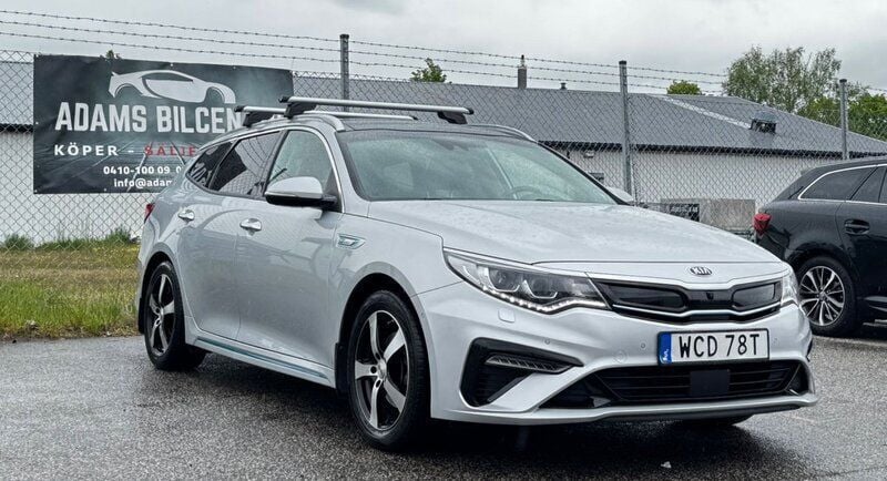 Grå Begagnad 2019 Kia Optima Hybrid 2 Sedan | 219 900 kr (Marknadspris) - Bild 1/4