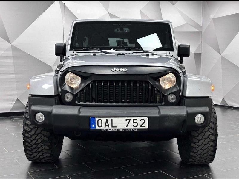 Grå Begagnad 2014 Jeep Wrangler Unlimited SUV | 259 000 kr - Bild 1/4