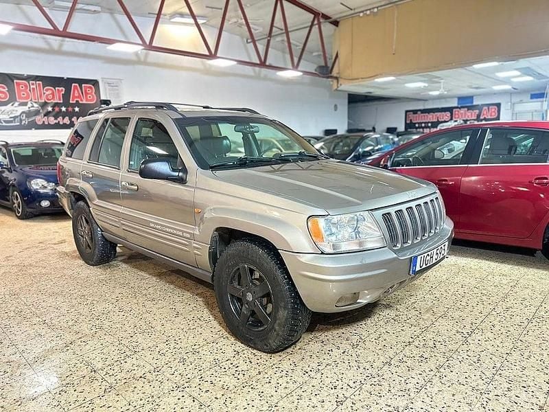 Grå Begagnad 1999 Jeep Grand Cherokee SUV | 69 900 kr (Superpris) - Bild 1/4