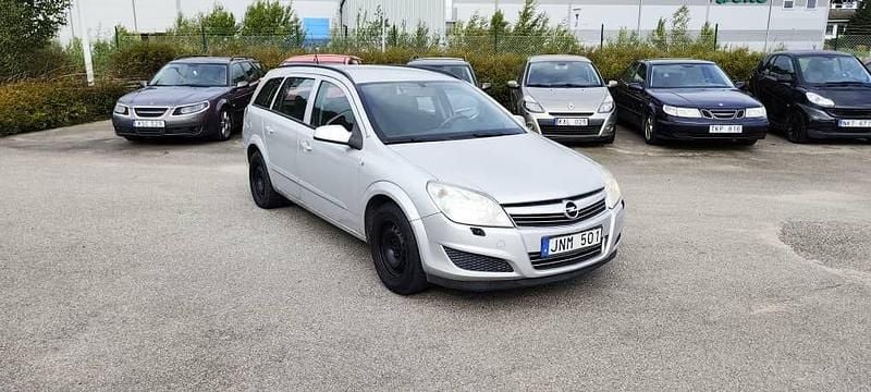 Grå Begagnad 2009 Opel Astra Kombi | 17 900 kr (Marknadspris) - Bild 1/4