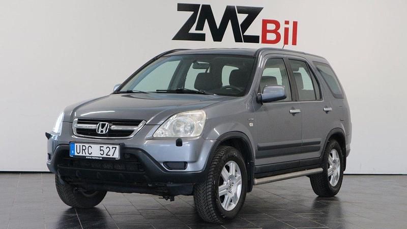 Silver Begagnad 2003 Honda CR-V SUV | 39 900 kr (Marknadspris) - Bild 1/4