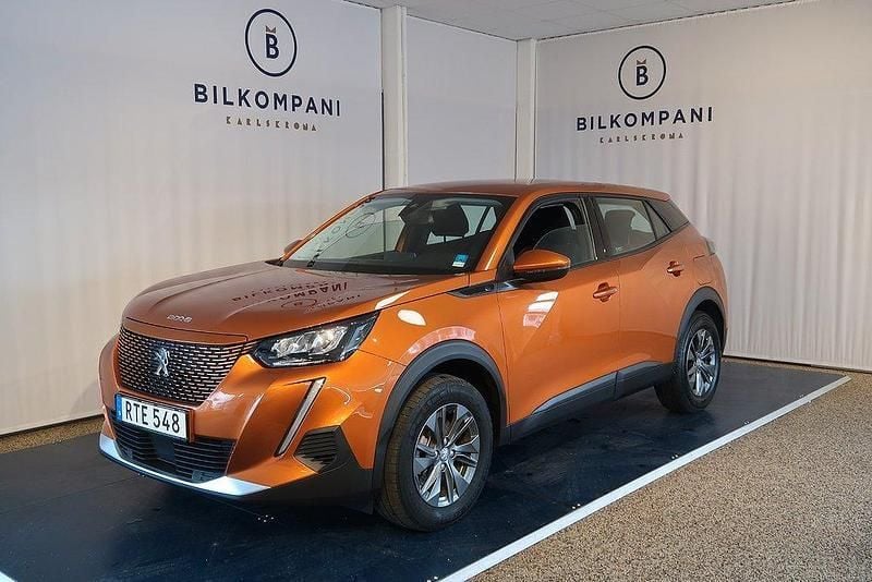 Orange Begagnad 2021 Peugeot e-2008 Active SUV | 169 800 kr (Bra pris) - Bild 1/4