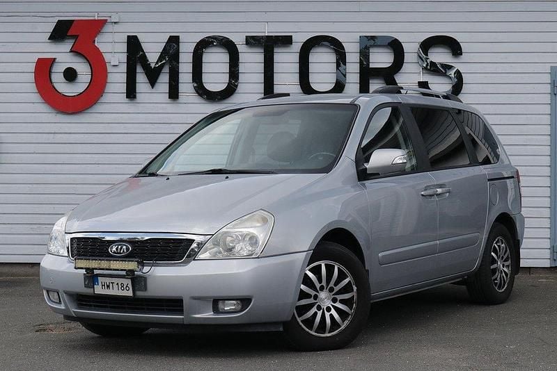 Silver Begagnad 2010 Kia Carnival Minibuss | 44 900 kr - Bild 1/4