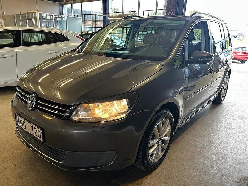 Mörkgrå (gråmetallic) Begagnad 2011 VW Touran Minibuss | 79 900 kr (Lite dyr) - Bild 1/4