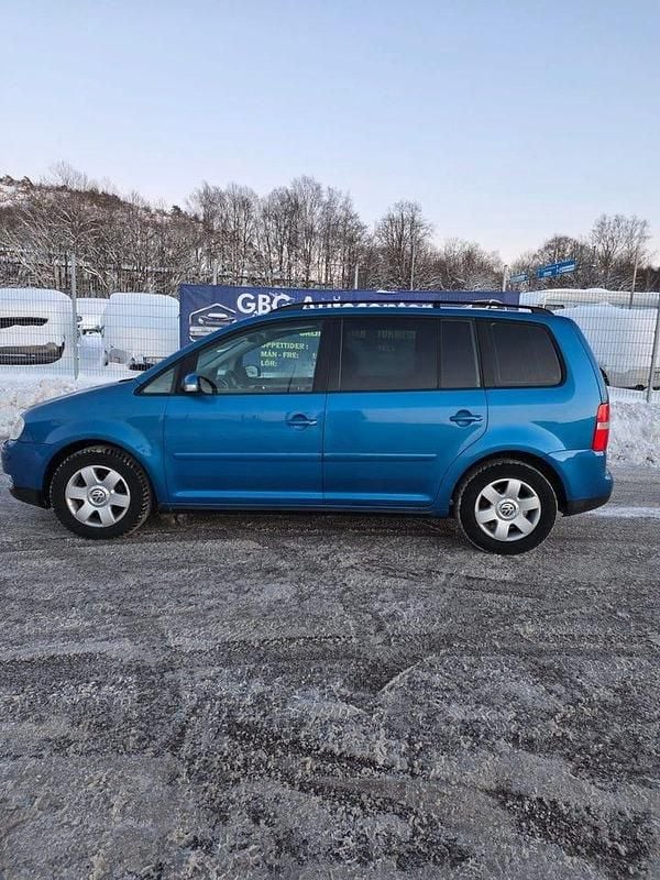 Begagnad VW Touran 150 HK (110 kW) 2005 Blå Minibuss